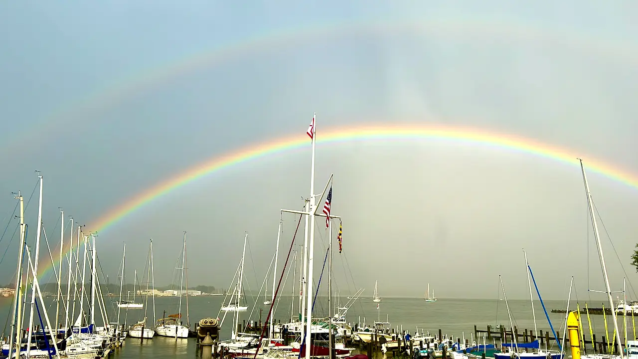A rainbow over the masts of a Chesapeake marina just after weather passed through